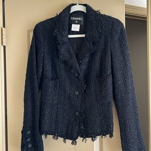 Black tweed Chanel blazer. Camila buttons in excellent condition. Size 40